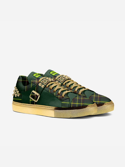 Green and black vegan sneakers by BYMANYC New York on a yellow sole, side view.