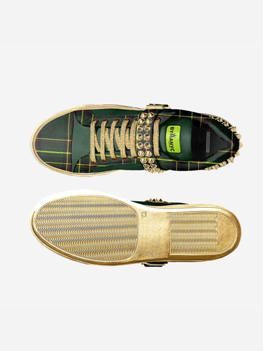 Green and black vegan sneakers by BYMANYC New York, angled view showing the yellow sole.