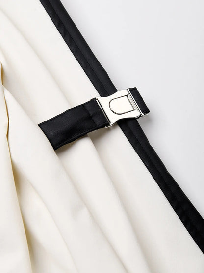Women's faux leather color-splicing trench coat by BYMANYC New York with contrasting panels.