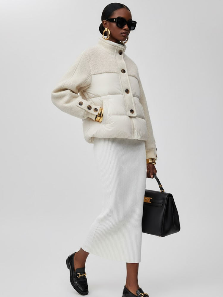 Women's longline asymmetric coat in white vegan leather by BYMANYC New York, front view.