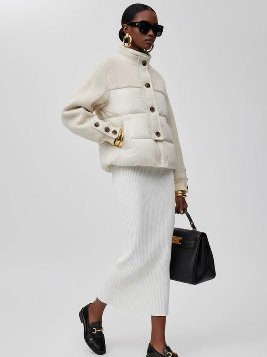Women's longline asymmetric coat in white vegan leather by BYMANYC New York, front view.