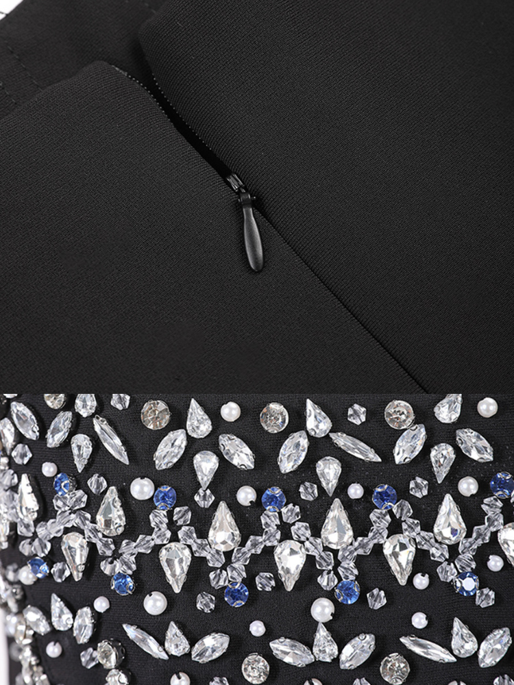 Women's strapless embellished midi dress in black by BYMANYC New York, close view of the stones.
