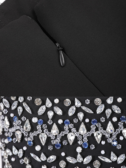 Women's strapless embellished midi dress in black by BYMANYC New York, close view of the stones.
