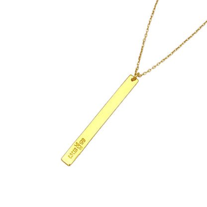 Close view of the slim brass bar engraved with Khmer script on a fine plated chain