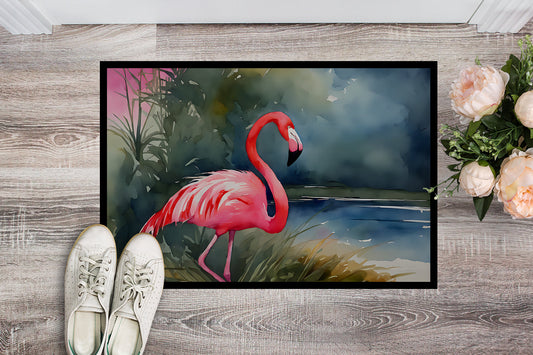 The 18 by 27 inch Flamingo artwork doormat seen from above on pale wood boards, a pair of shoes at its edge for scale.