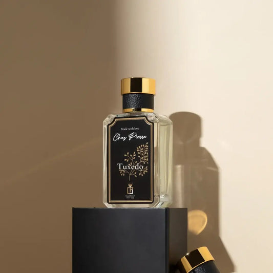 The 50 ml bottle of Chez Pierre Tuxedo Eau de Parfum, a men's scent that turns to spice and soft florals in the middle.