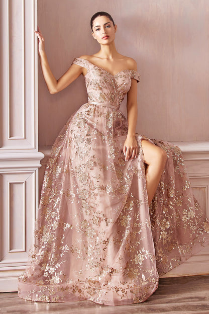 Off-shoulder glitter floral ball gown with a full skirt and a leg slit.