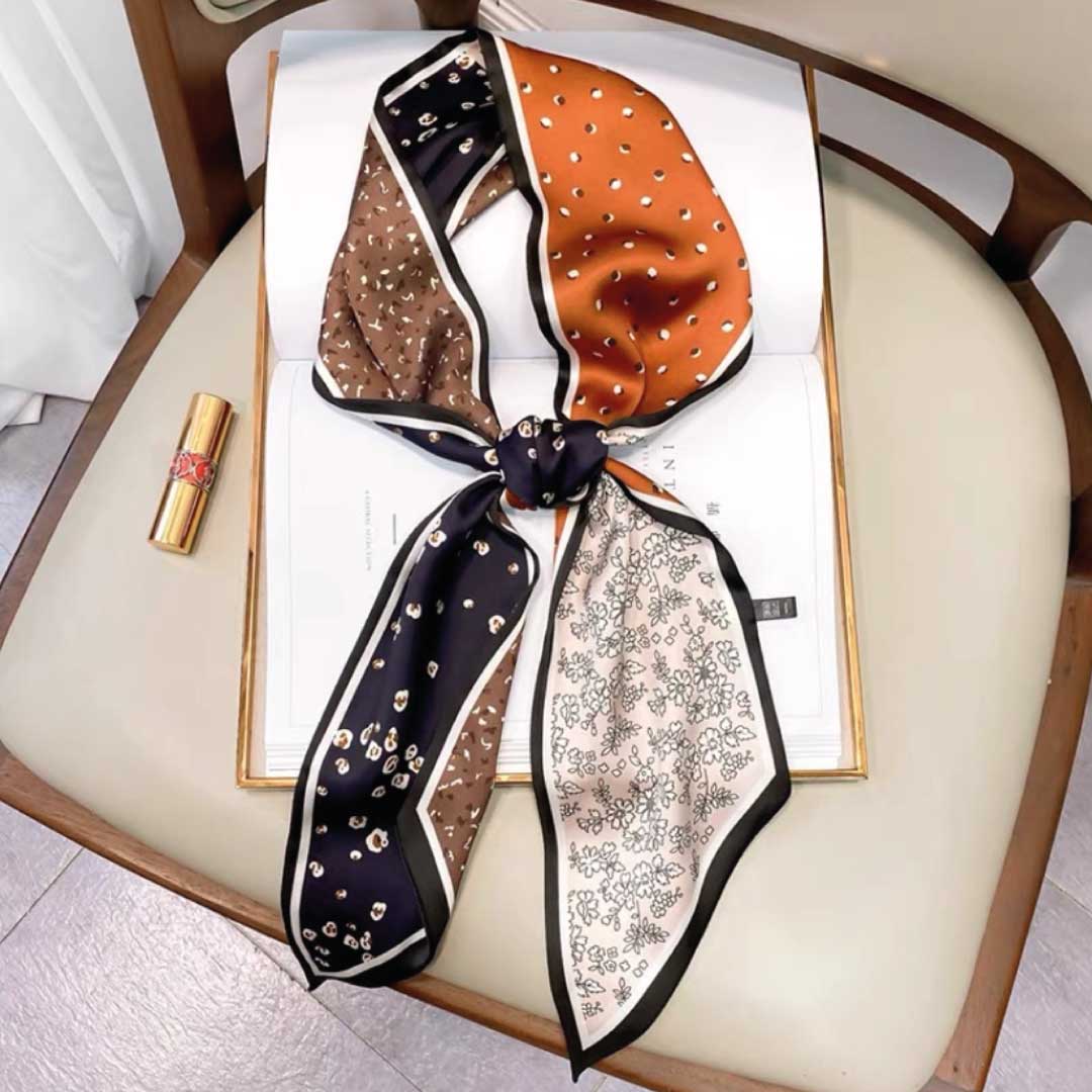 Ochre colorway, a long silk scarf in panels of ochre dots, brown dots, navy florals and cream florals