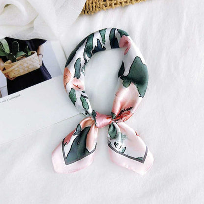 Rose colorway folded and knotted into a loop with two pointed ends, the way it sits at the neck