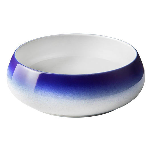 Porcelain cocotte bowl 6.9 inches across in blue and white, deep sided with a rolled edge.