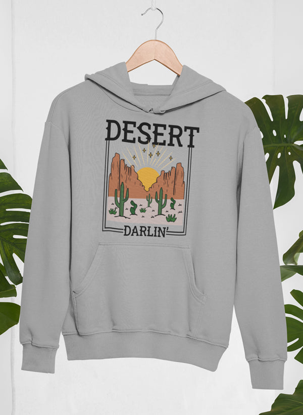 Athletic Dark Grey fleece hoodie on a hanger, framed desert scene on the chest.