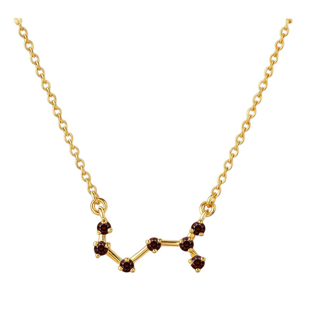 Garnet version on white, seven small red stones joined by short gold tone bars