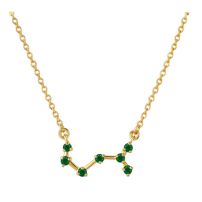 Green tourmaline version on white, seven small green stones joined by short gold tone bars