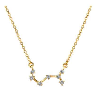 White zircon version on white, seven small clear stones joined by short gold tone bars