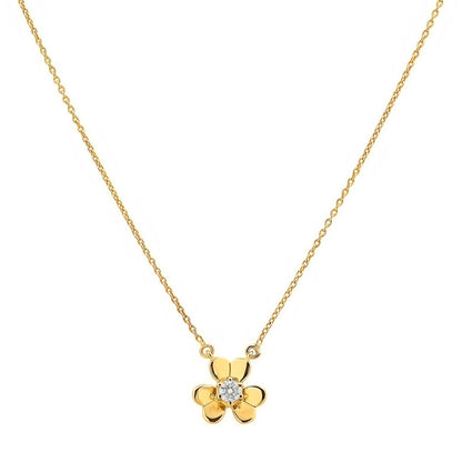Moissanite version on white, a clear sparkling stone in the middle of three gold tone petals