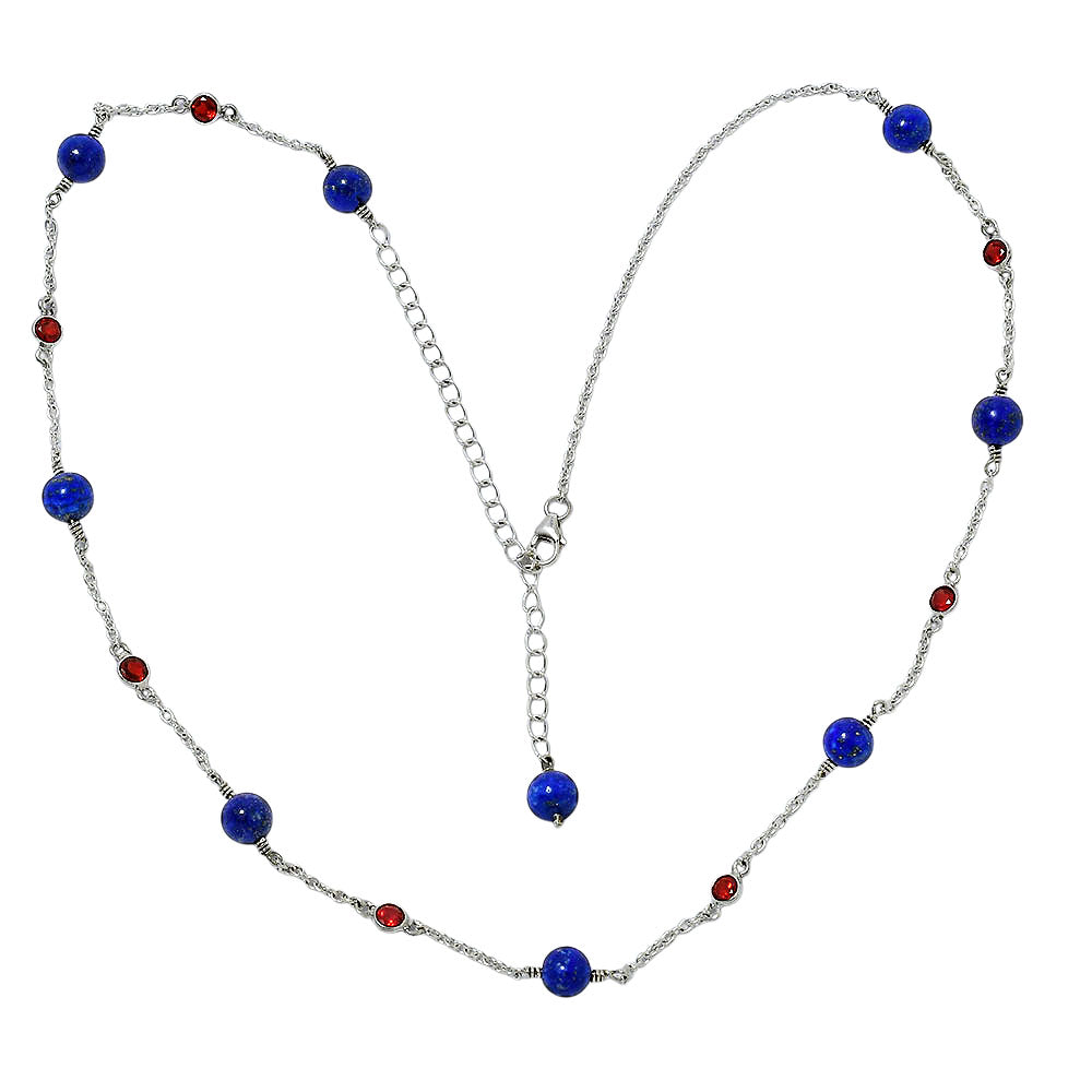 Garnet version laid flat, lapis beads along the chain and the extender ending in a lapis bead