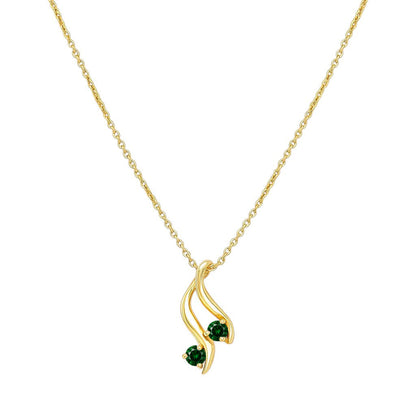 Green tourmaline version on white, two green stones set along the curved gold tone swirl