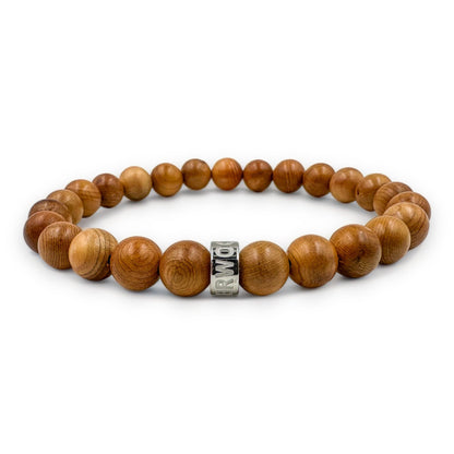Cascade Tanglepine canary wood beaded bracelet, low angle view