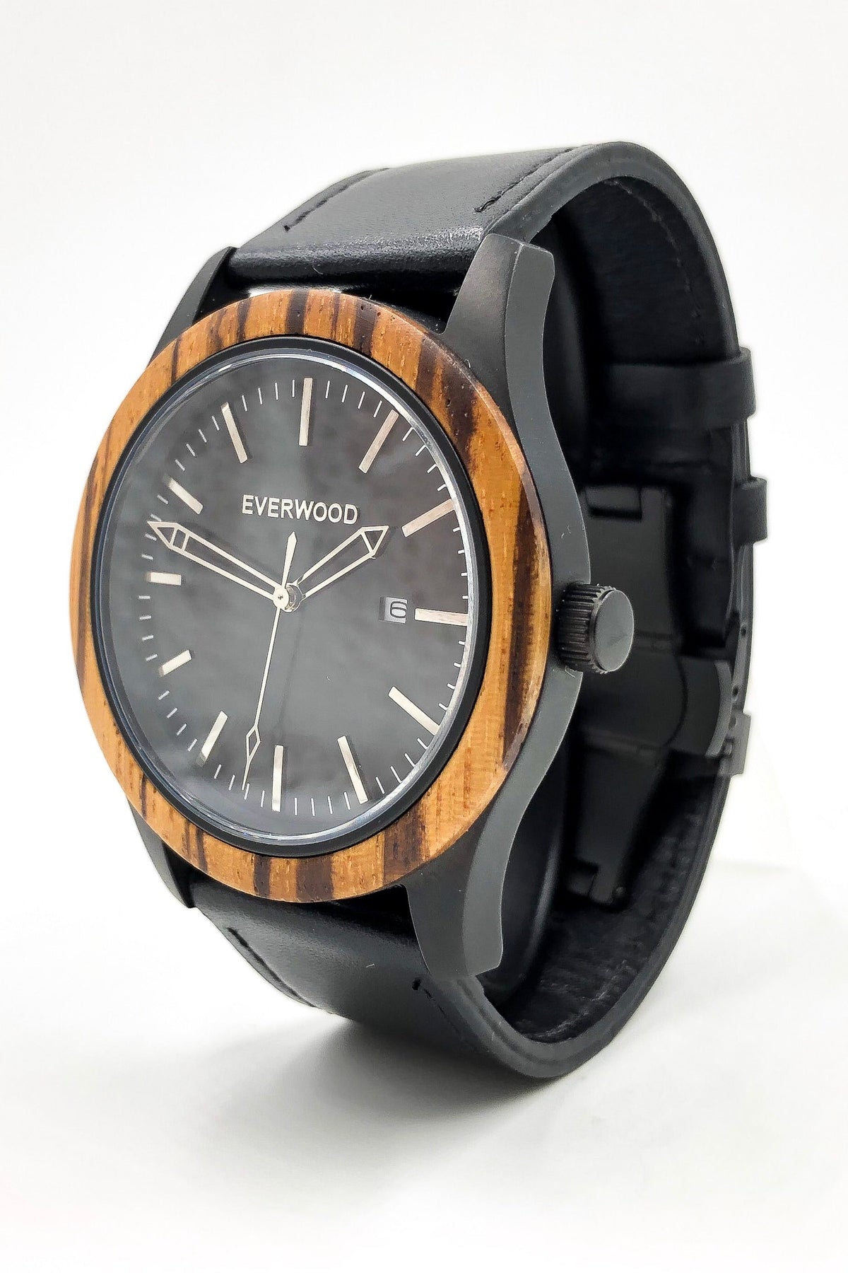 Inverness zebrawood wooden watch with black dial and black leather strap, angled close up