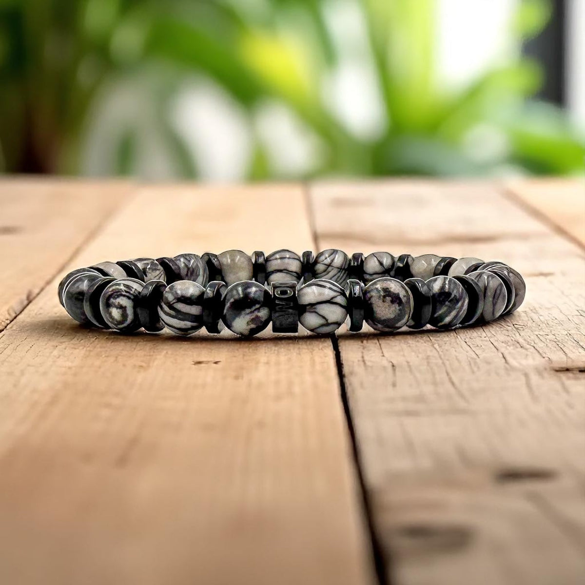 Pulse Gravel Web black silk stone beaded bracelet, lifestyle photo
