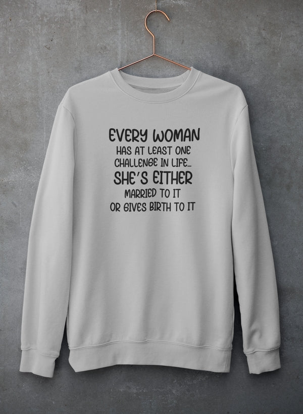 Athletic Heather crewneck on a copper hanger against concrete, four-line joke in black.