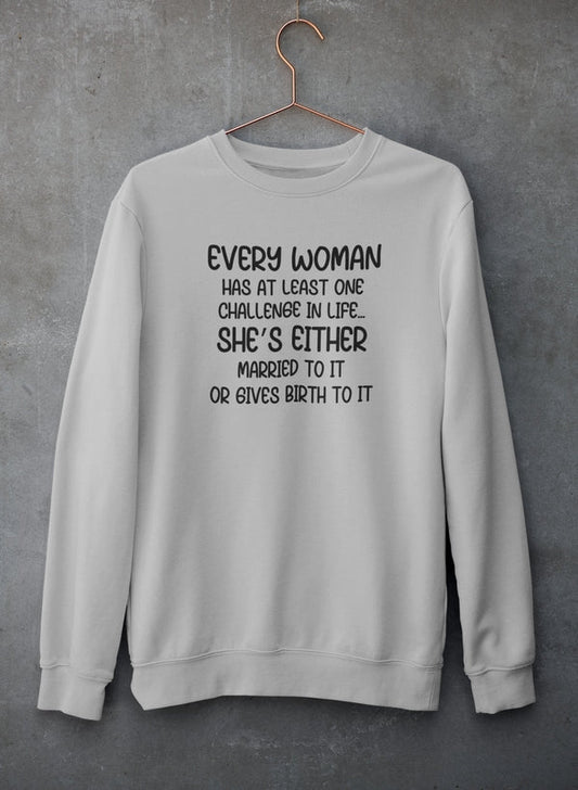Athletic Heather crewneck on a copper hanger against concrete, four-line joke in black.