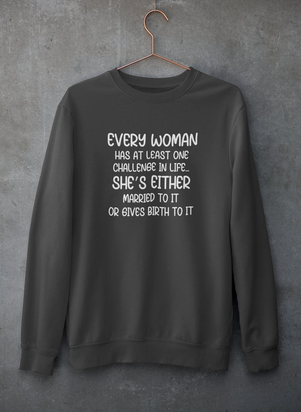 Black crewneck sweatshirt on a copper hanger against concrete, four-line joke in white.