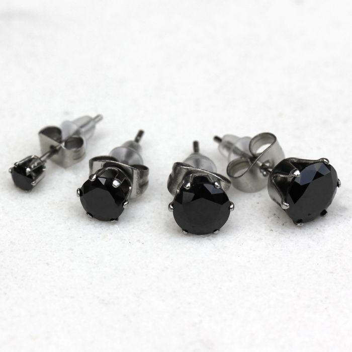 Black CZ stud earrings in four sizes with six prong settings on steel posts
