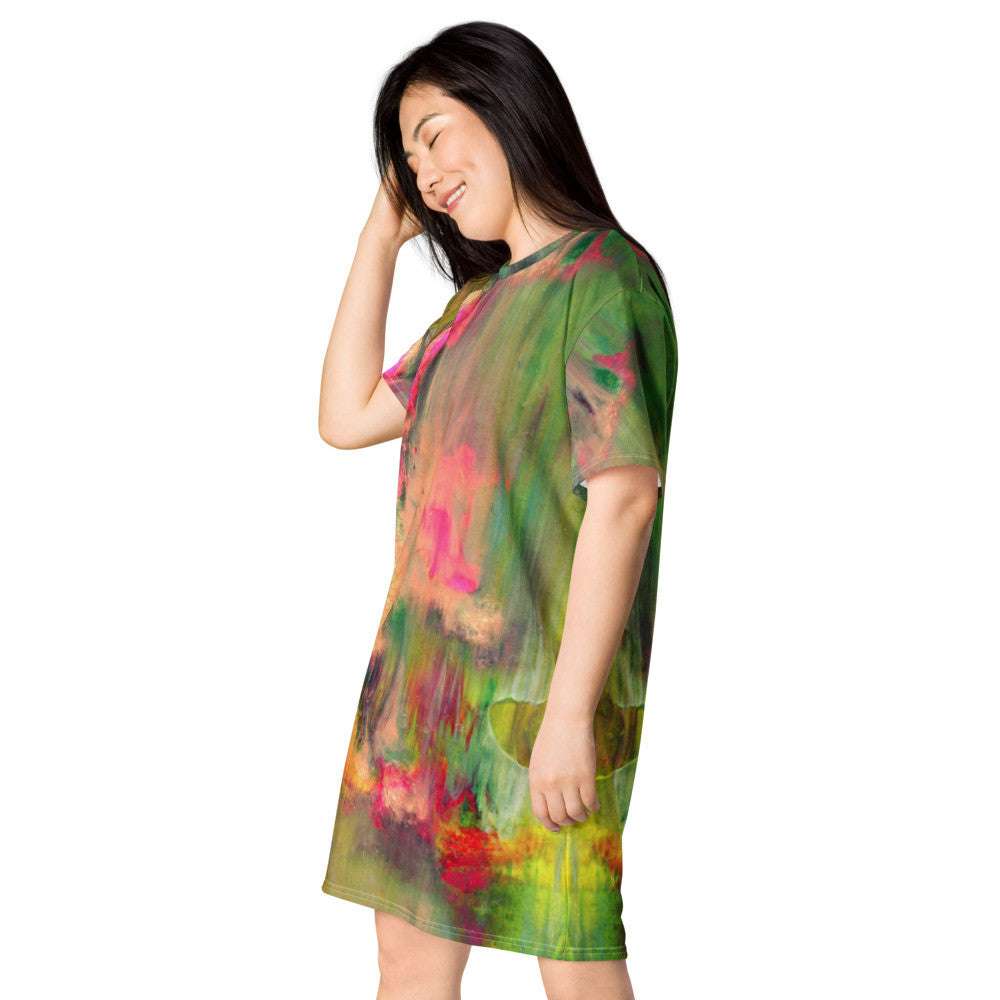Oversize T-shirt dress in a soft green and pink bloom, drapey rather than fitted at the body.