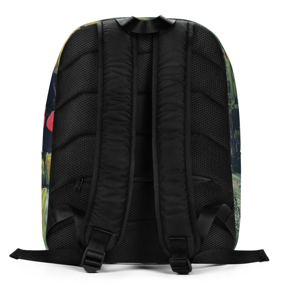 Minimalist 20 litre backpack in a green and yellow foliage print, with padded straps.