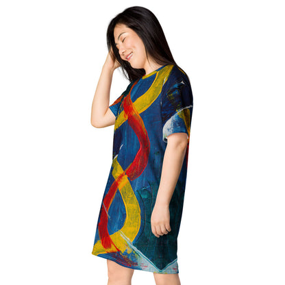 Oversize T-shirt dress on a navy ground, with red and yellow ribbons winding down the body.