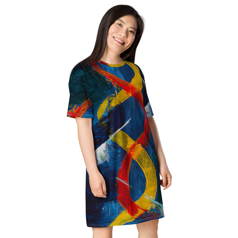 Oversize T-shirt dress on a navy ground, with red and yellow ribbons winding down the body.