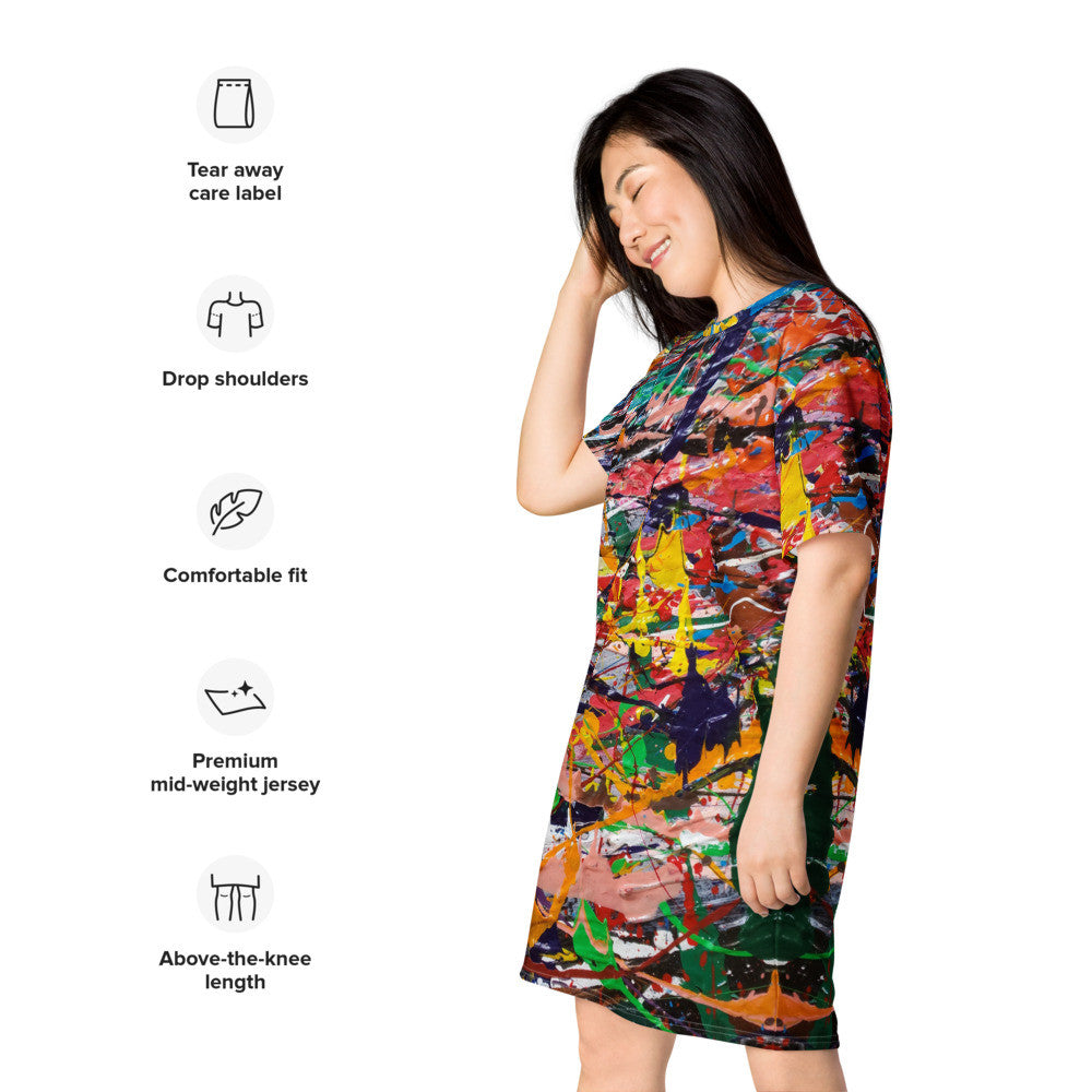 Drop shoulder T-shirt dress in an orange and multicolor landscape print, relaxed through the body.