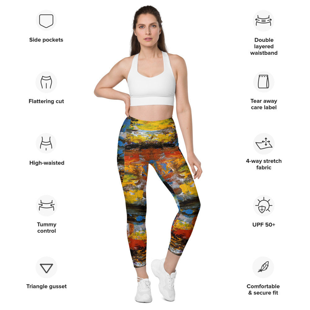 High-waisted leggings printed in orange and yellow, with a side pocket at the thigh.