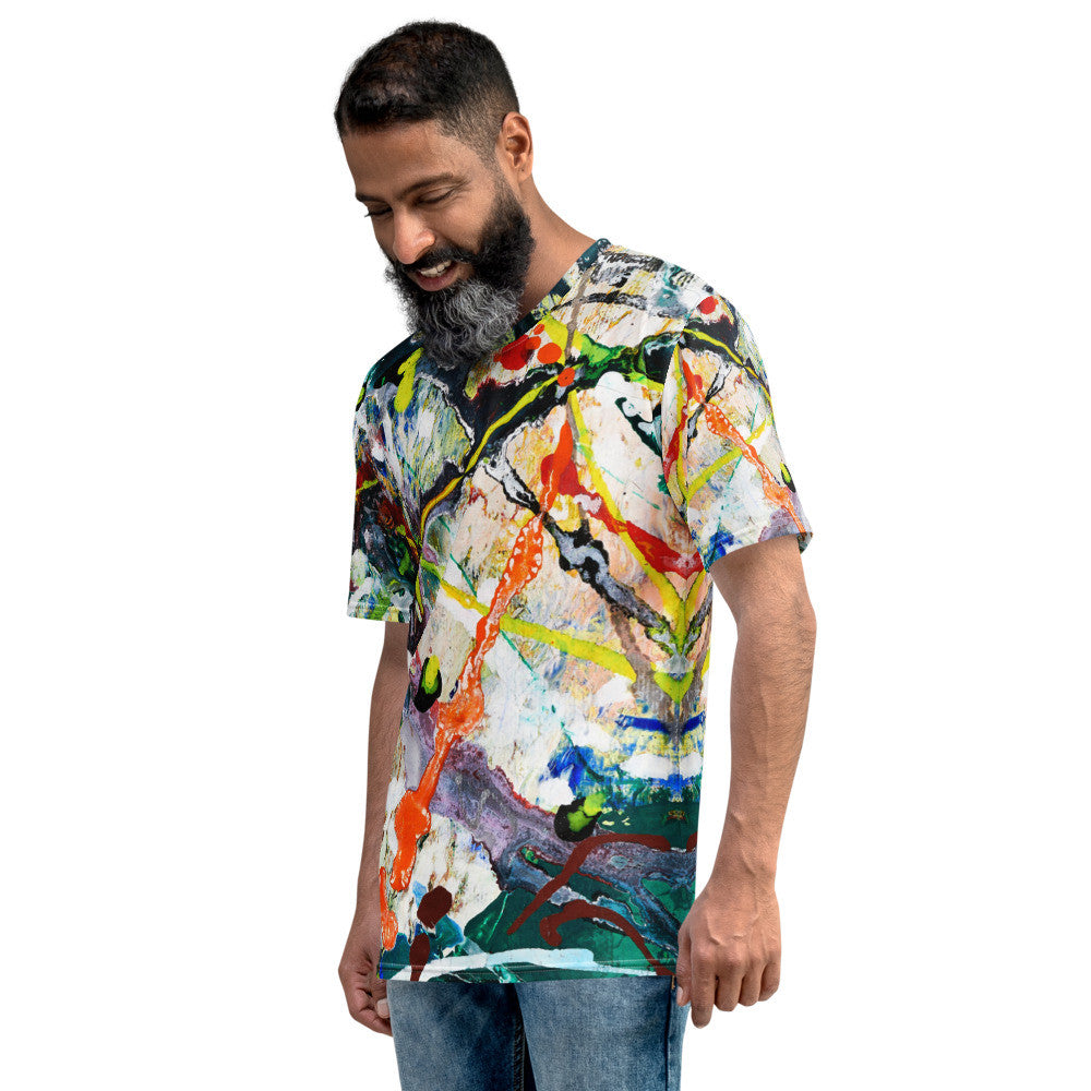 Men's jersey tee in white with a dense paint splatter print carried over the shoulders.