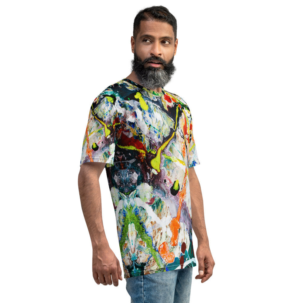 Men's jersey tee in white with a dense paint splatter print carried over the shoulders.