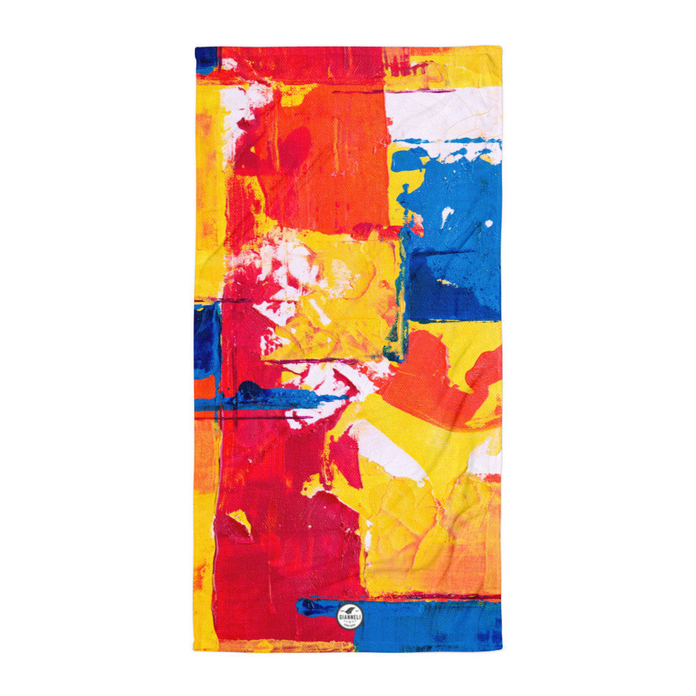 Bath towel printed in red, yellow and blue blocks, with an absorbent cotton terry back.