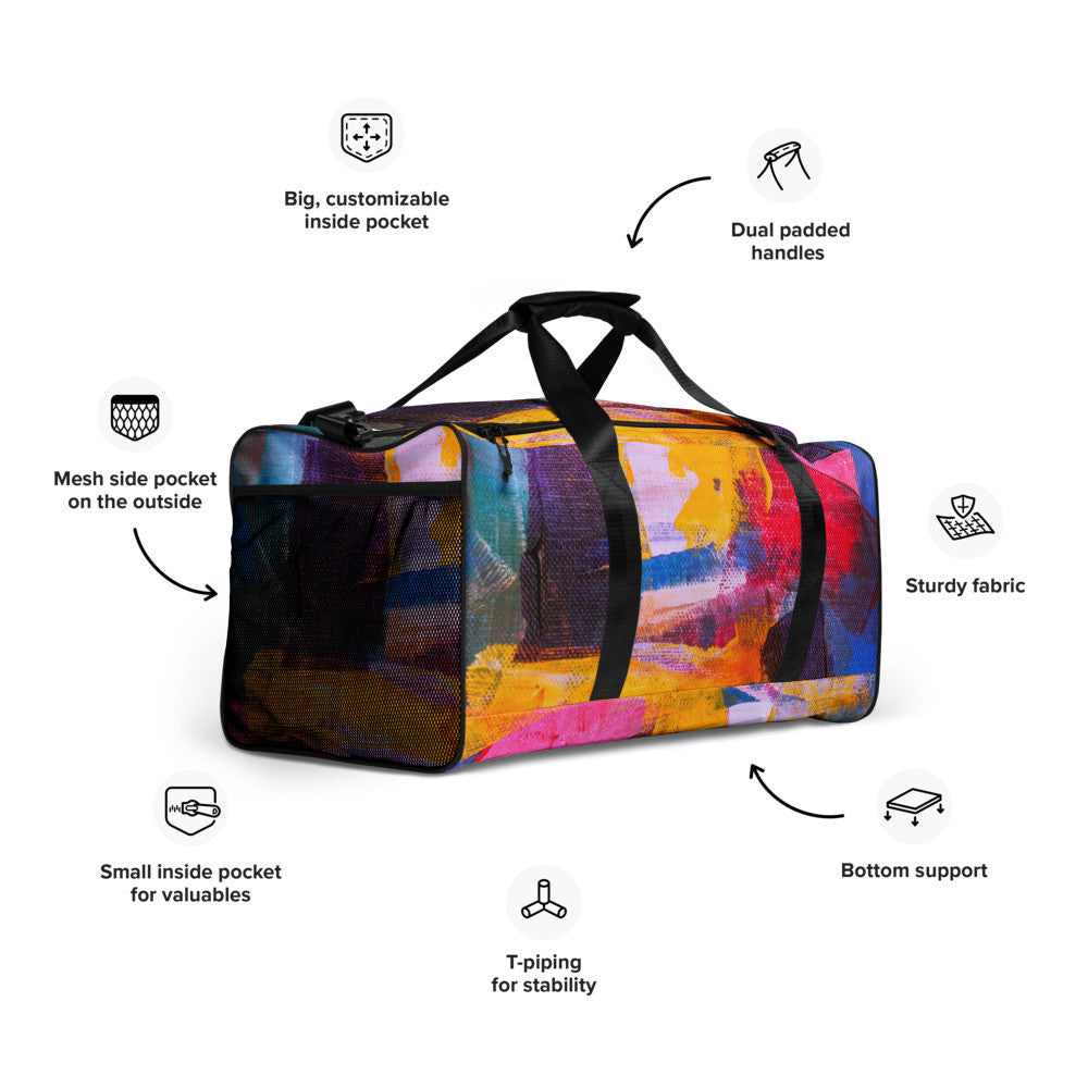 Travel duffle bag in orange, blue and cream brushwork, with an adjustable padded strap.