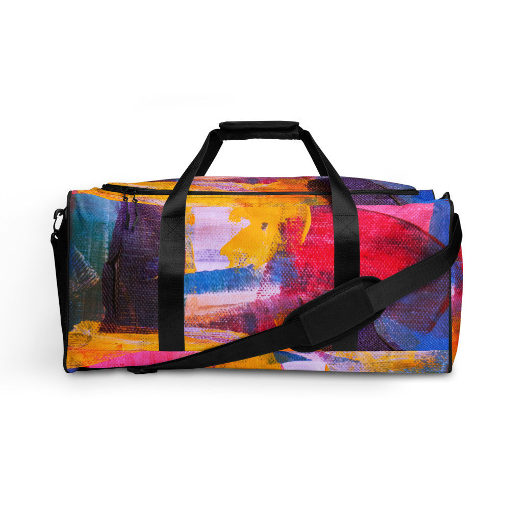 Travel duffle bag in orange, blue and cream brushwork, with an adjustable padded strap.