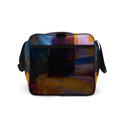 Travel duffle bag in orange, blue and cream brushwork, with an adjustable padded strap.