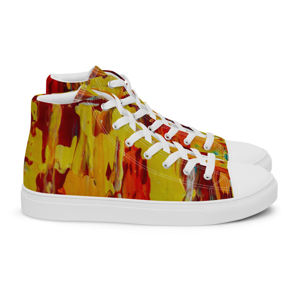Women's high top canvas sneaker in yellow and red flame-like strokes, laced to the ankle.