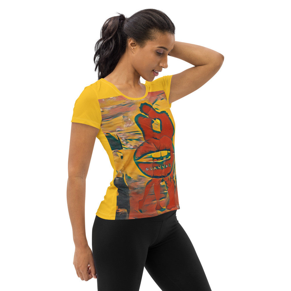 The Kiss women's athletic tee, yellow ground with two figures printed at the center of the chest.