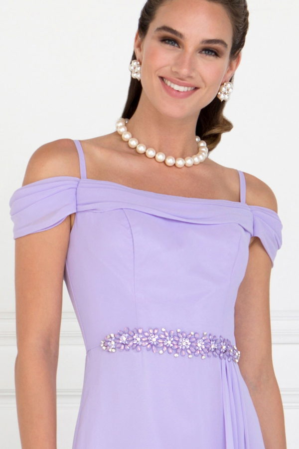 Lilac chiffon gown with slender straps and a floor-length skirt.