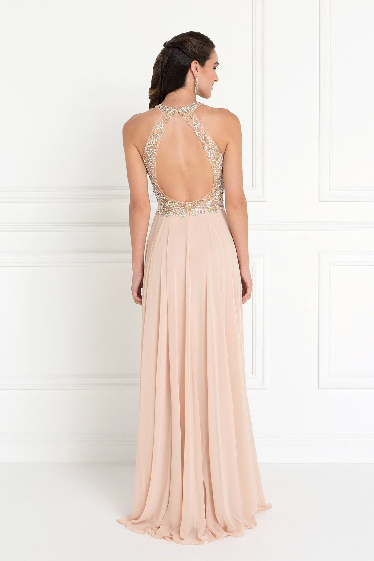 Champagne chiffon gown, sleeveless, with beading across the scoop neckline.