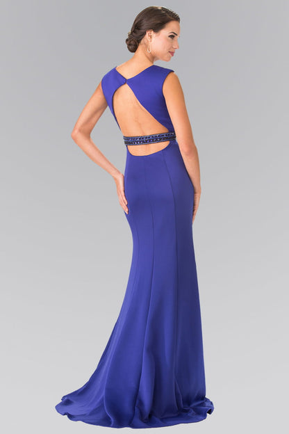 Royal blue jersey mermaid gown, sleeveless, with a trumpet hem.