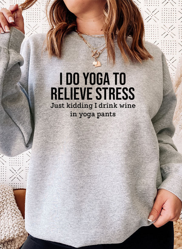 Athletic heather cotton fleece crewneck, yoga slogan printed across the chest.