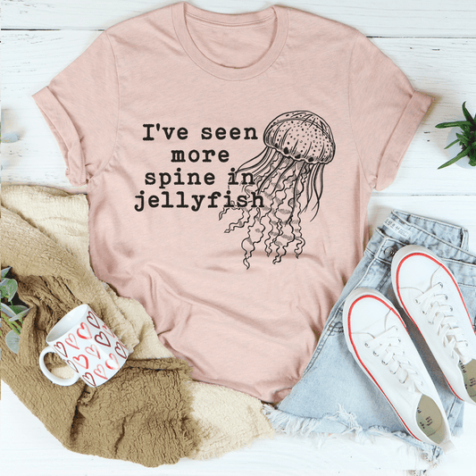 Cotton T-shirt featuring a jellyfish spine graphic design on a peachy background.
