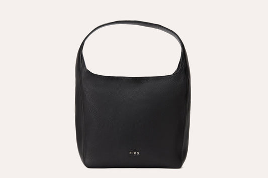 Black pebbled leather hobo bag with a single wide shoulder strap, front view