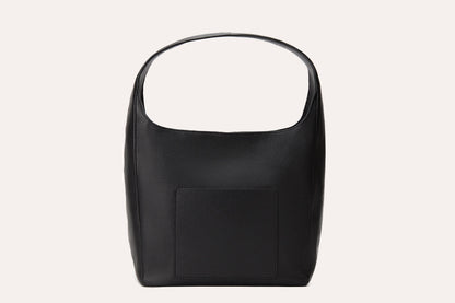 Back of the black hobo bag showing the outside slip pocket