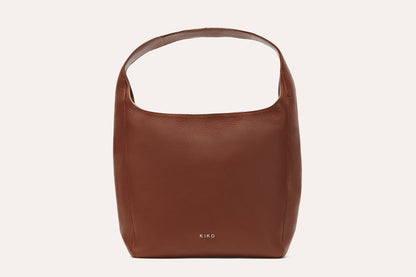 Dark brown pebbled leather hobo bag with a single wide shoulder strap, front view